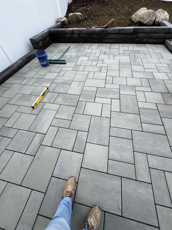 Paver patio with timber planter edging